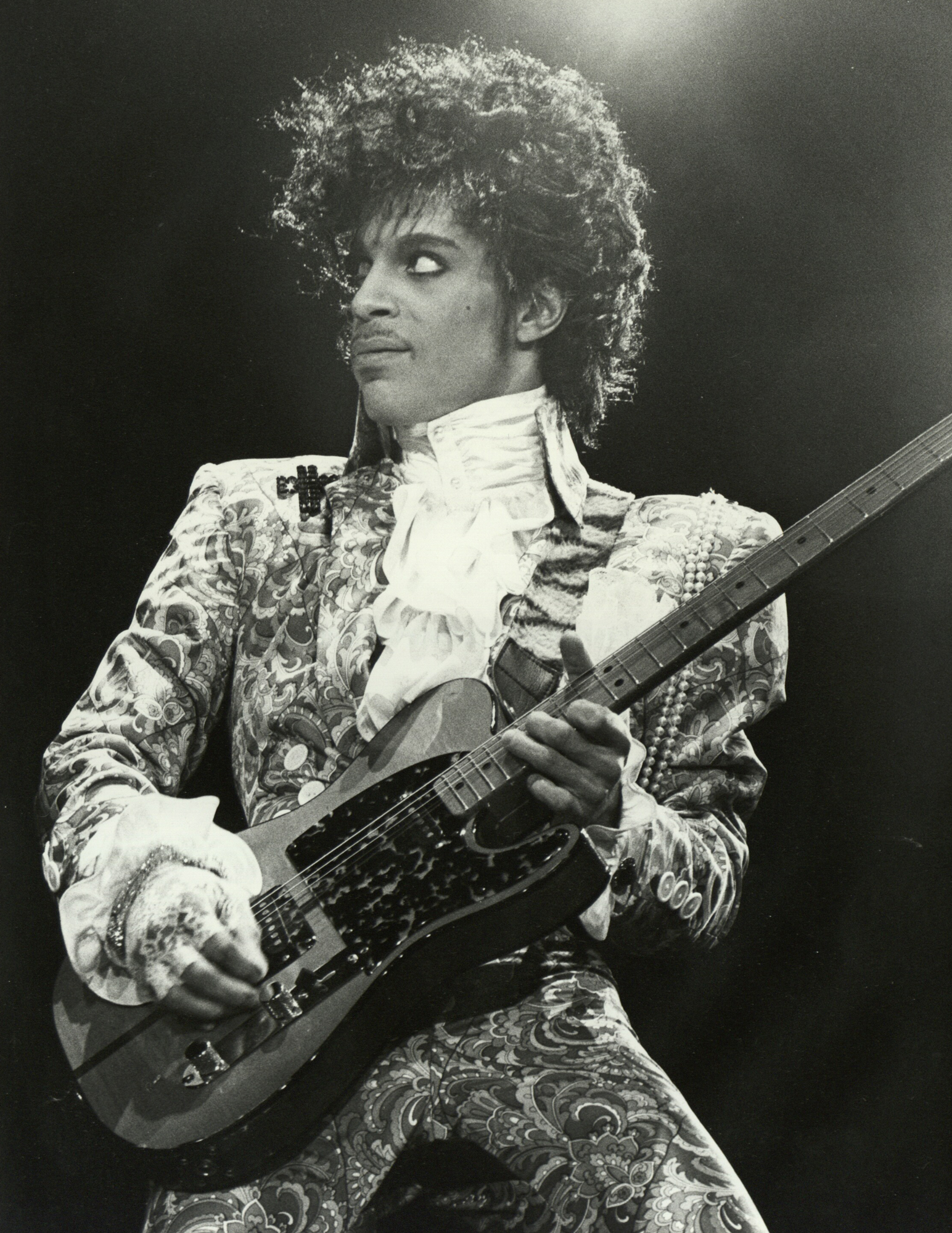 1-prince-passport-photo-holding.jpg